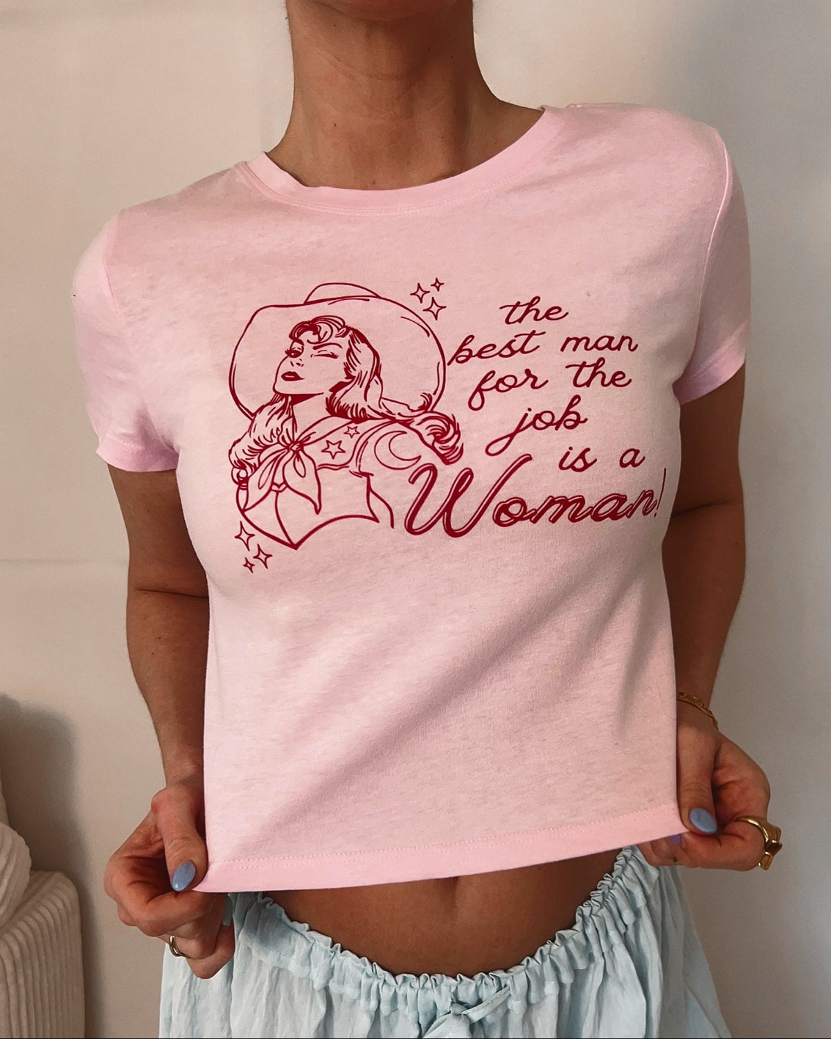 The Best Man for the Job Is a Woman Baby Tee